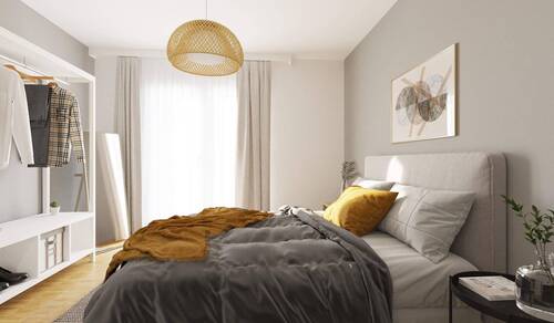 Durch bodentiefe Fenster wird das Schlafzimmer hel - 