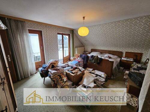 Schlafzimmer mit Balkon OG - 