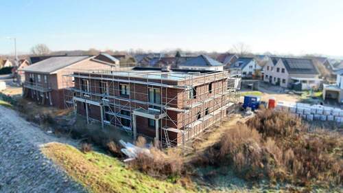 Neubau Rückseite - 1 Zimmer Mehrfamilienhaus, Wohnhaus in Rieste