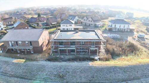 Neubau Rückseite Luftbild - Mehrfamilienhaus, Wohnhaus mit 330,20 m&sup2; in Rieste zum Kaufen