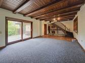 Wohnzimmer im Erdgeschoss - 4 Zimmer Einfamilienhaus zum Kaufen in Itzehoe