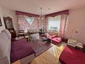 Wohnzimmer - 7 Zimmer Einfamilienhaus zum Kaufen in Ihlow