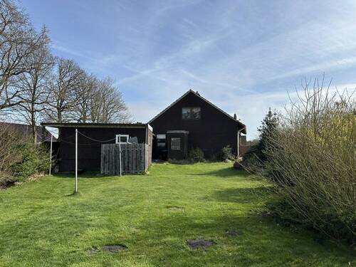 Rückansicht - 5 Zimmer Einfamilienhaus zum Kaufen in Rhauderfehn