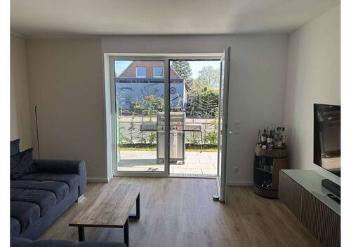 Wohnzimmer - Terrassenwohnung mit 58,40 m&sup2; in Heist zur Miete