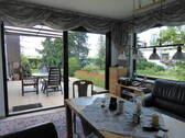 Wintergarten mit Gartenblick - 
