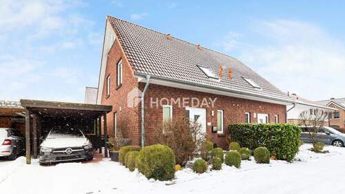 Außenansicht 1 - Vier Zimmer, Südterrasse und eigener Garten - wohnen auf zwei Ebenen plus Ausbaureserve im Dach