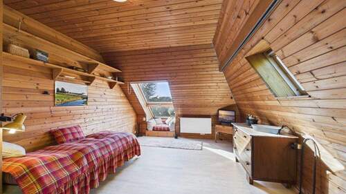 Sitzen mit Blick in den Garten - 