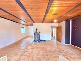 Wohnzimmer mit Kamin - Bungalow mit 120,00 m&sup2; in Rosche zum Kaufen
