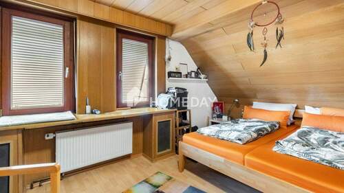 1. OG Schlafzimmer 2 - 