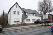 Front seitlich - 1 Zimmer Mehrfamilienhaus, Wohnhaus zum Kaufen in Salzkotten