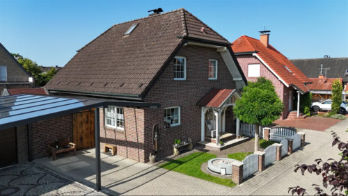 Seitenblick mit Carport - 5 Zimmer Einfamilienhaus zum Kaufen in Olfen