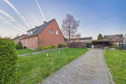 Außenansicht - 4 Zimmer Doppelhaushälfte zum Kaufen in Neuenhaus