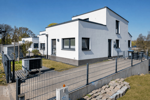 Außenansicht - Luxuriöse Doppelhaushälfte mit Kamin, Sauna und Wasserblick!