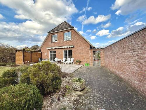 Gartenansicht - Raumwunder Ein-Zweifamilienhaus mit Garage & Wohlfühlgarten freistehend in Massivbauweise Uelzen-Westerweyhe