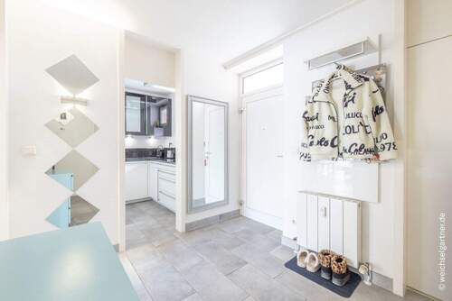 Eingangsbereich mit Küche - Etagenwohnung mit 76,80 m&sup2; in München zum Kaufen