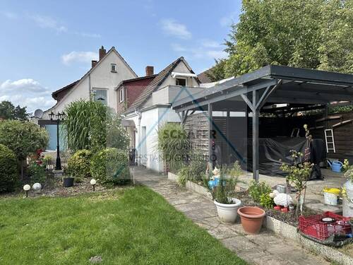 Überdachte Terrasse - 6 Zimmer Mehrfamilienhaus, Wohnhaus in Bassum