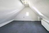 Schlafzimmer im Dachgeschoss - 