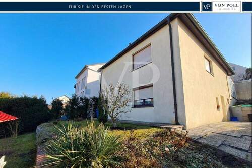 Titelfoto, Ansicht hinten rechts (1), #124523 - Würzburg Uninähe: Ideales Starterpaket- Gepflegtes Einfamilienhaus mit ELW zu verkaufen