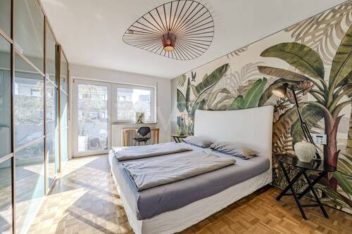 Schlafzimmer mit Zugang zum Ost-Balkon - 