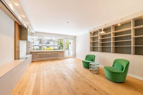 Wohnzimmer - 4 Zimmer Etagenwohnung in München