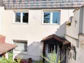 Terrasse, Schuppen und Eingang von Hinten ins Kell - 