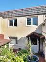 Terrasse, Schuppen und Eingang von Hinten ins Kell - 