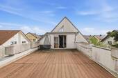 Dachterrasse mit Blick auf das Haus - 