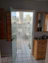 Badezimmer mit Glastür - 