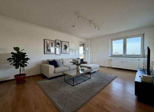 Wohnzimmer mit Zugang zur West-Loggia - 2 Zimmer Etagenwohnung in Quickborn