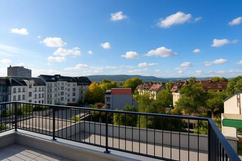 W24 (KI) - DAS DACHSTUDIO ÜBER DEN DÄCHERN DES VORDEREN WESTENS