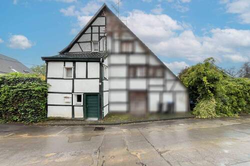 Außenansicht - Für Macher und Kreative: Gestaltbares Einfamilienhaus in Waldrandlage