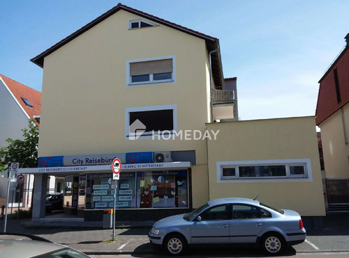 Außenansicht 1 - Ertragreiches Immobilienpaket: Mehrfamilienhaus mit Gewerbe und Parkplätzen in zentraler Lage!