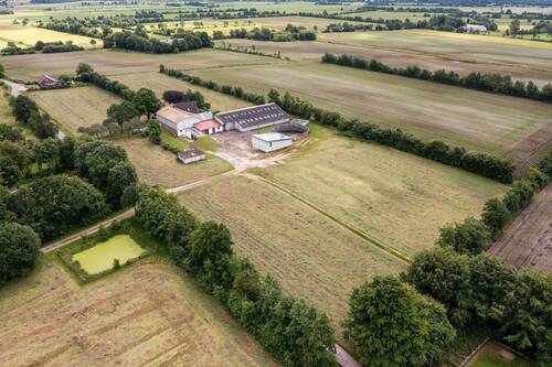 Bild 2 - 6 Zimmer Mehrfamilienhaus, Wohnhaus zum Kaufen in Großenwiehe