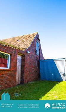 Außenansicht ehem. Stall - Einfamilienhaus mit 75,70 m&sup2; in Großheide zum Kaufen