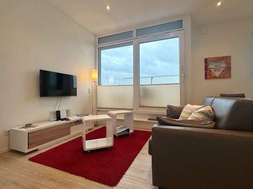 Wohnzimmer mit Zugang Balkon - 