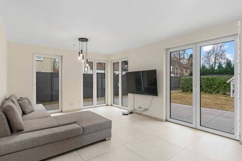 Sitzbereich mit Zugang zur Terrasse. - Etagenwohnung mit 134,20 m² in Bremen zum Kaufen