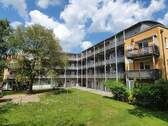 Hofansicht - 1-Zimmer-Dachgeschosswohnung mit Dachterrasse und Aufzug im Zentrum