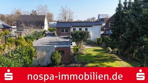Garten - Wohnen und Arbeiten vereint - Vielseitiges Haus mit viel Potenzial für Ihre Zukunft!