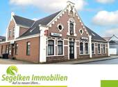 Die Außenansicht - Neuwertige Zwei-Zimmer-Erdgeschosswohnung in Arsten