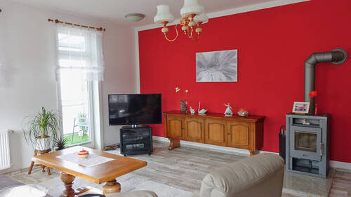 Wohnzimmer mit Kaminofen - 