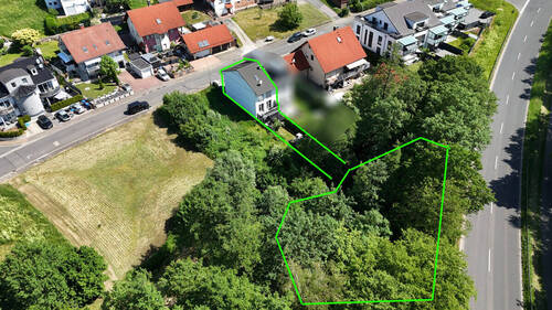 Luftbild - DIETZ: Junges Familienhaus mit 837 m² großen, idyllischen Waldgrundstück in Laufach!
