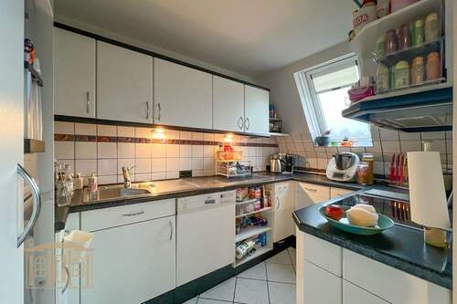 Küche mit Einbauküche - Etagenwohnung mit 60,00 m&sup2; in Wuppertal zur Miete