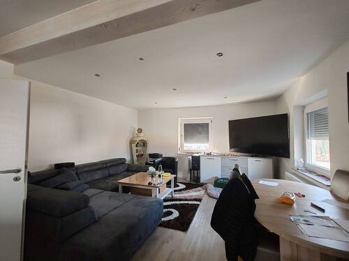 Wohnzimmer - Etagenwohnung mit 104,00 m&sup2; in Garching an der Alz zum Kaufen