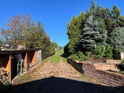04 - Einfahrt 1 - Högstraße 77.jpeg - Einfamilienhaus mit 185,00 m² in Tambach-Dietharz zum Kaufen