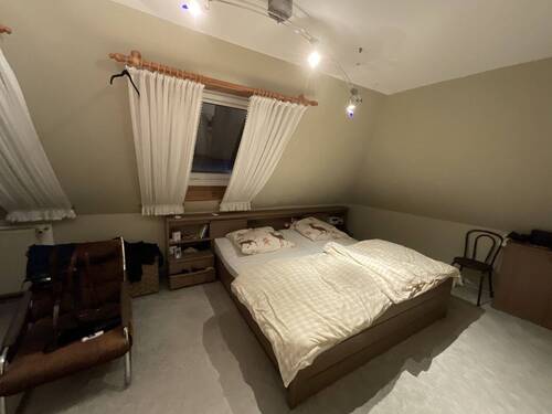 Schlafzimmer DG Wohnung Haupthaus - 