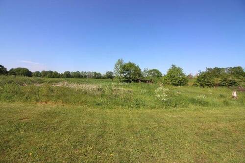 Bild 1 - Bebautes Grundstück mit großem Potential