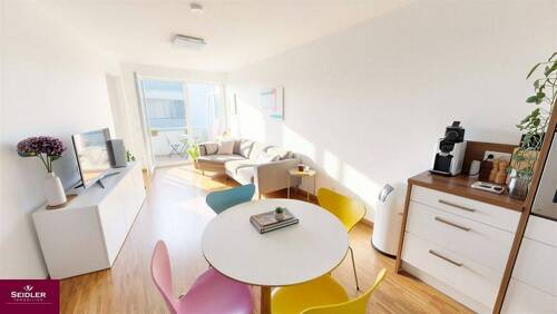 Wohnzimmer mit Zugang zum Balkon - Etagenwohnung mit 53,60 m&sup2; in Merzhausen zum Kaufen