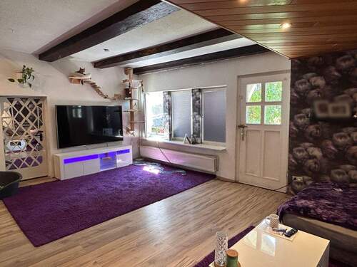 Wohnzimmer - 6 Zimmer Mehrfamilienhaus, Wohnhaus zum Kaufen in Reinhardshagen