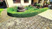 Garten mit Brunnen - 
