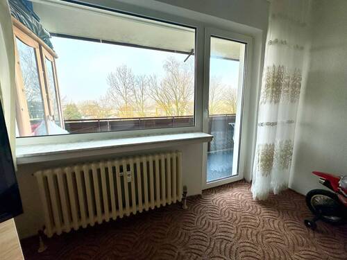 Wohnzimmer/Balkon - 2 Zimmer Etagenwohnung in Haan